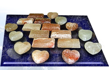 Picture of a table with shaped heart and soap crystal salt