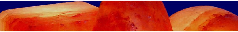 Top banner picture of a close up of three lit shaped salt lamps on the selling page