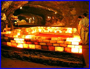 Picture of the inside of a salt mine with illuminated square lights